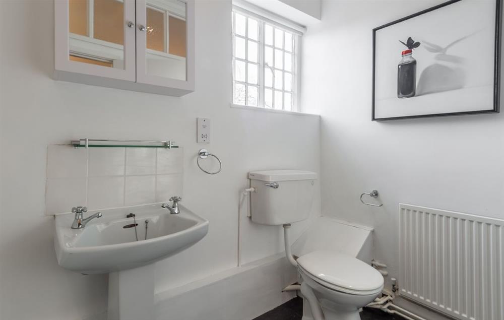 First floor: Family bathroom with bath and shower over at The Tack House, Near Holkham