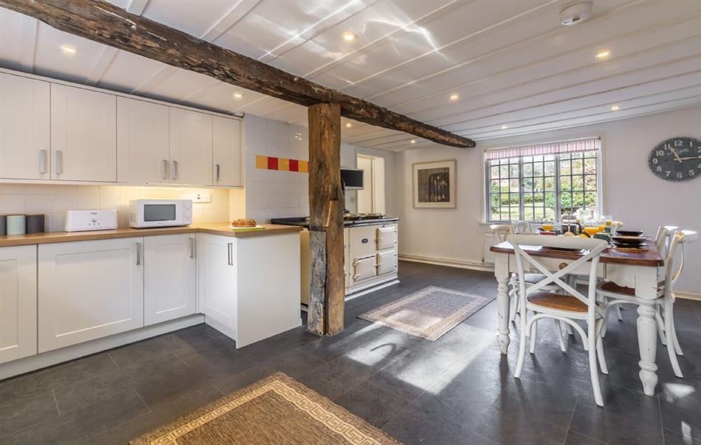 Ground floor: Large open plan kitchen and dining room with traditional features at The Tack House, Near Holkham