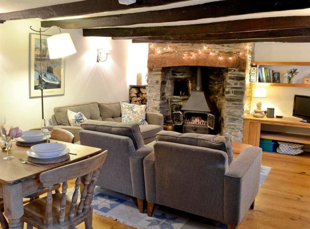 Living room/dining room at The Thatch Cottage in South Petherwin, near Launceston, Cornwall