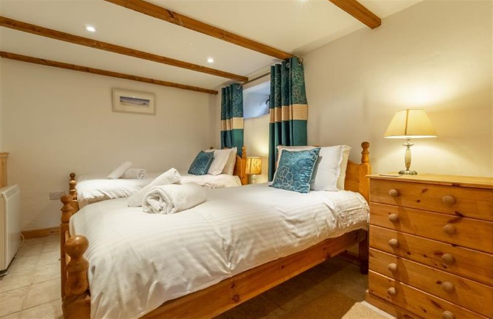 Bedroom two with twin beds at The Threshing Barn, Cusgarne, Truro 