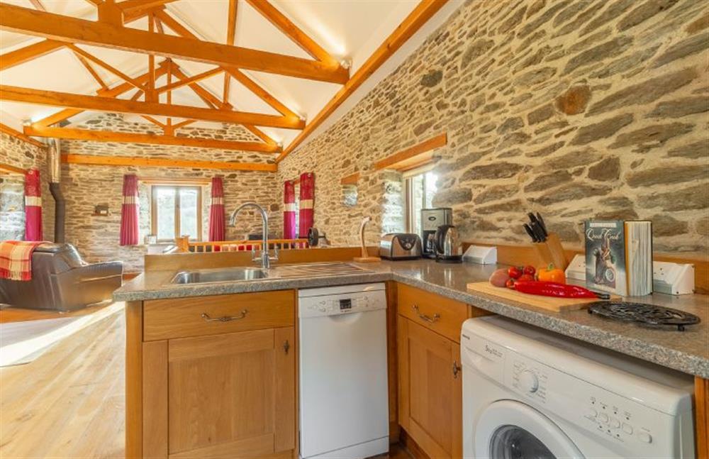 Fully equipped kitchen with dishwasher and washing machine at The Threshing Barn, Cusgarne, Truro 