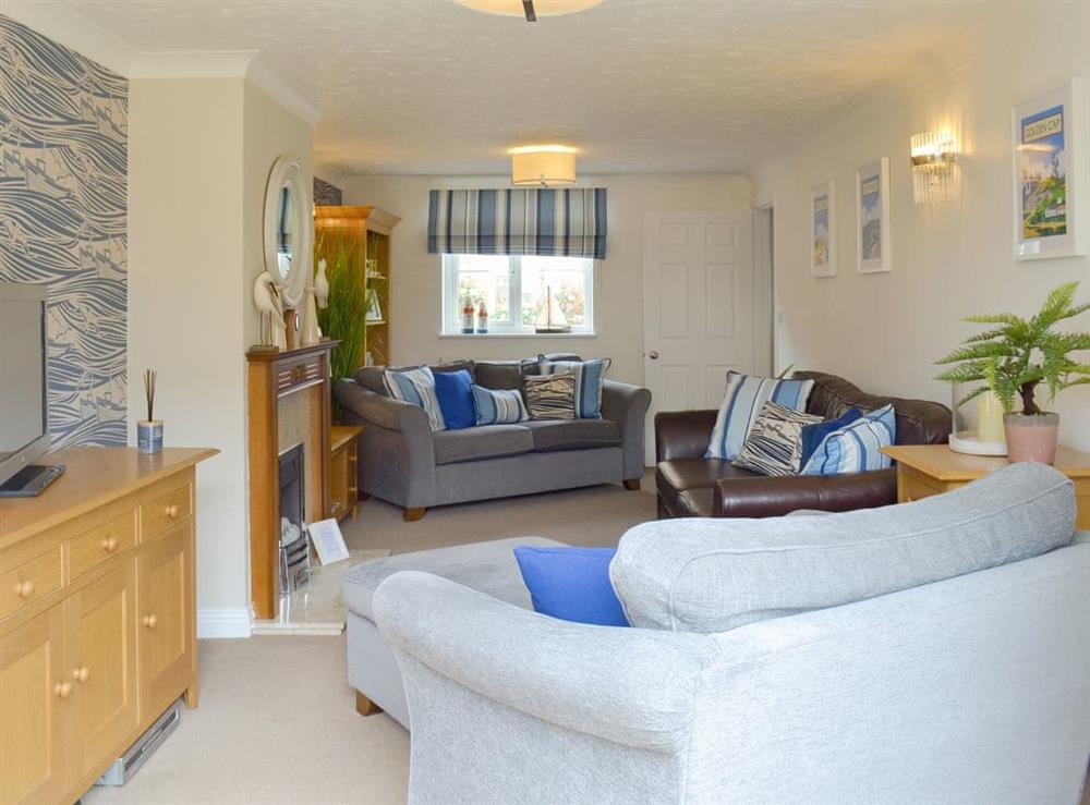 Spacious living room at The Tides in Bridport, Dorset