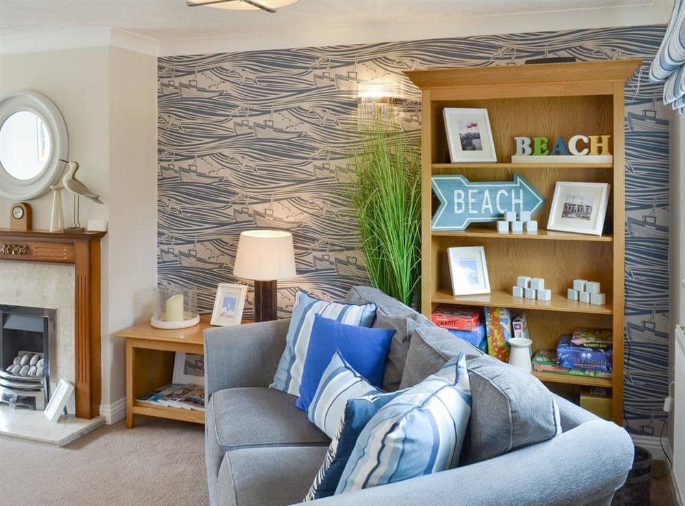 Stylish living room at The Tides in Bridport, Dorset