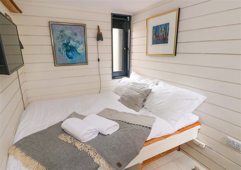 This is a bedroom at The Tiny House, Nine Wells near Solva