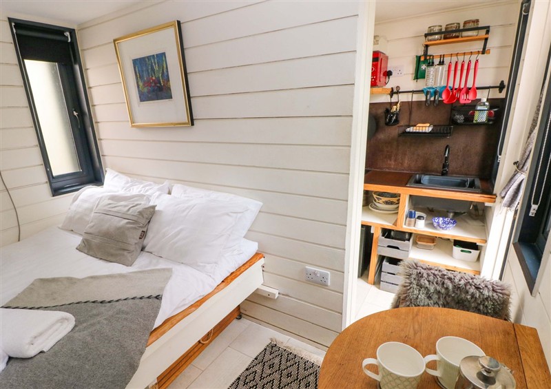 This is the bedroom at The Tiny House, Nine Wells near Solva