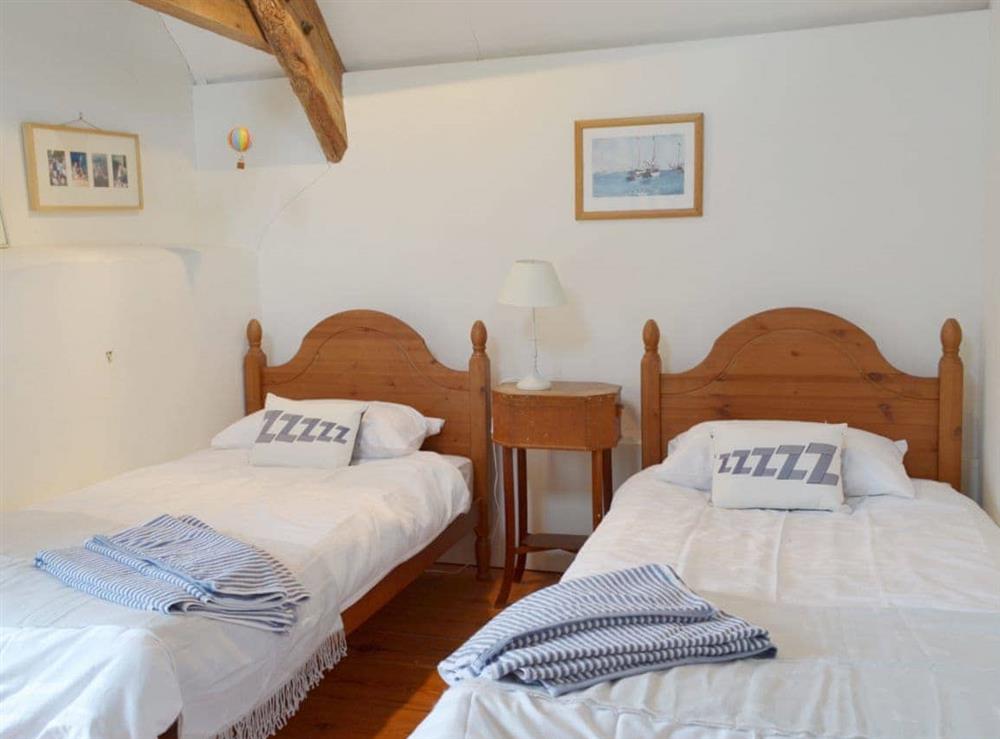 Delightful beamed twin bedroom at The Tithe Barn in Huxham, near Exeter, Devon