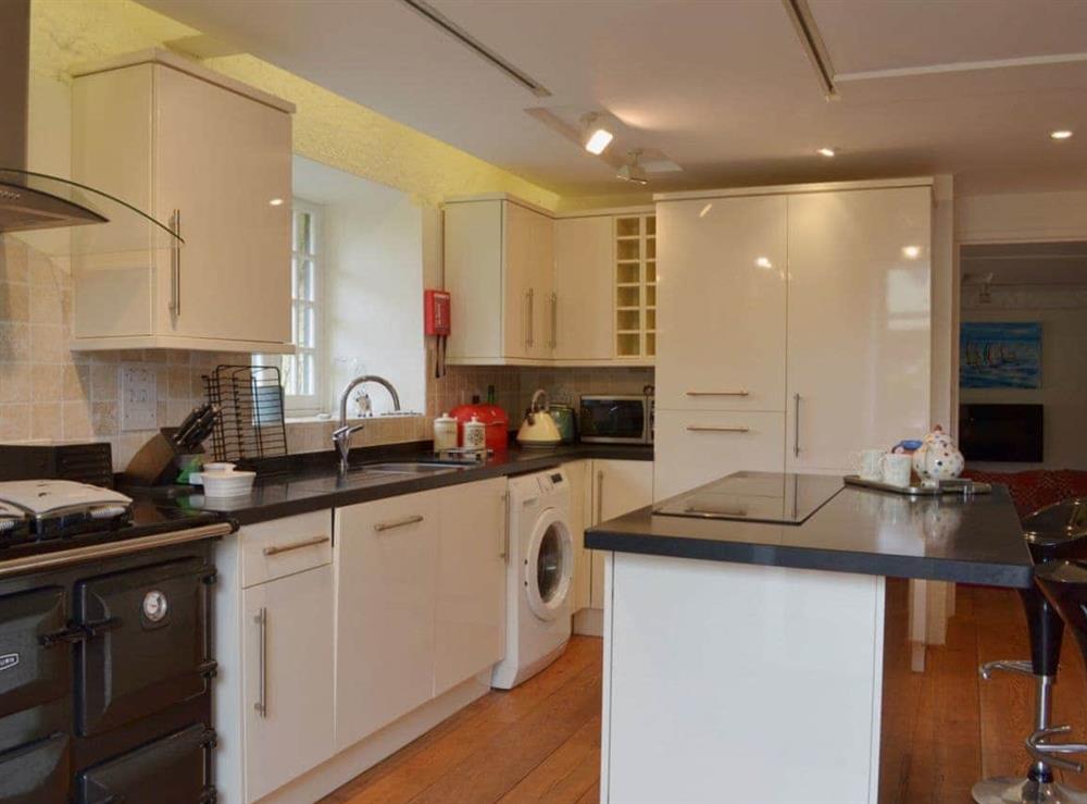 With a Rayburn range the kitchen is equipped to a very high standard at The Tithe Barn in Huxham, near Exeter, Devon