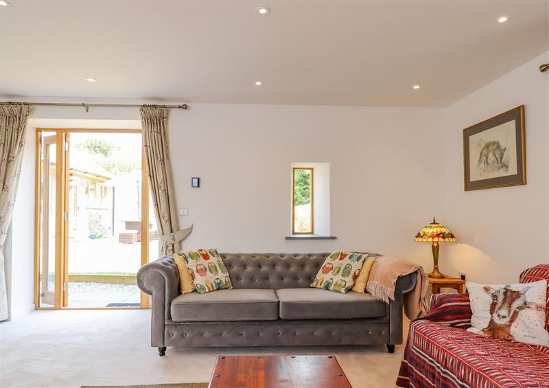 Enjoy the living room at The Tithe Barn, South Molton