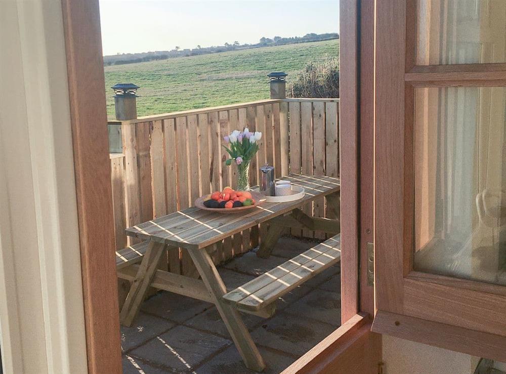 Countryside view through stable door