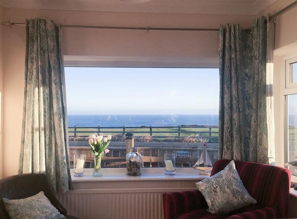 Sea view from the kitchen andc hill out area at The Toll Bar in Sandsend, near Whitby, North Yorkshire