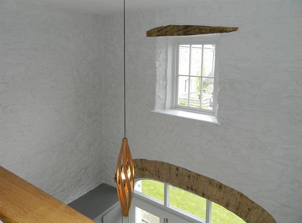 Light and airy stairwell with contemporary lighting at The Tower in Dreenhill, near Haverfordwest, Pembrokeshire, Dyfed