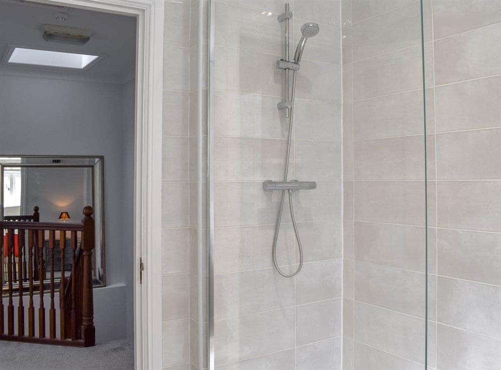 Well presetned bathroom with ¾ roll-top bath and shower cubicle (photo 2) at The Town House in Wimborne, Dorset