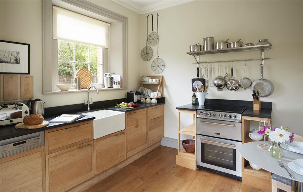 Fully equipped kitchen with solid oak worktops and miele appliances at The Treasury, Aylsham near Norwich