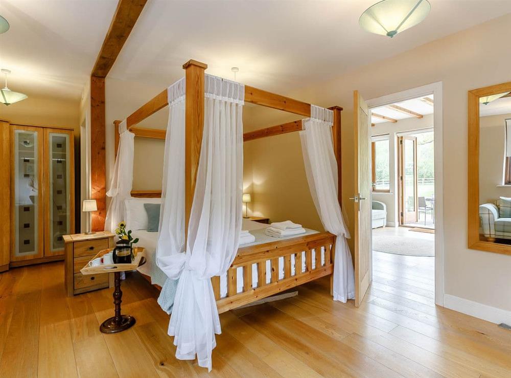 Four Poster bedroom at The Treehouse in Malvern, Herefordshire