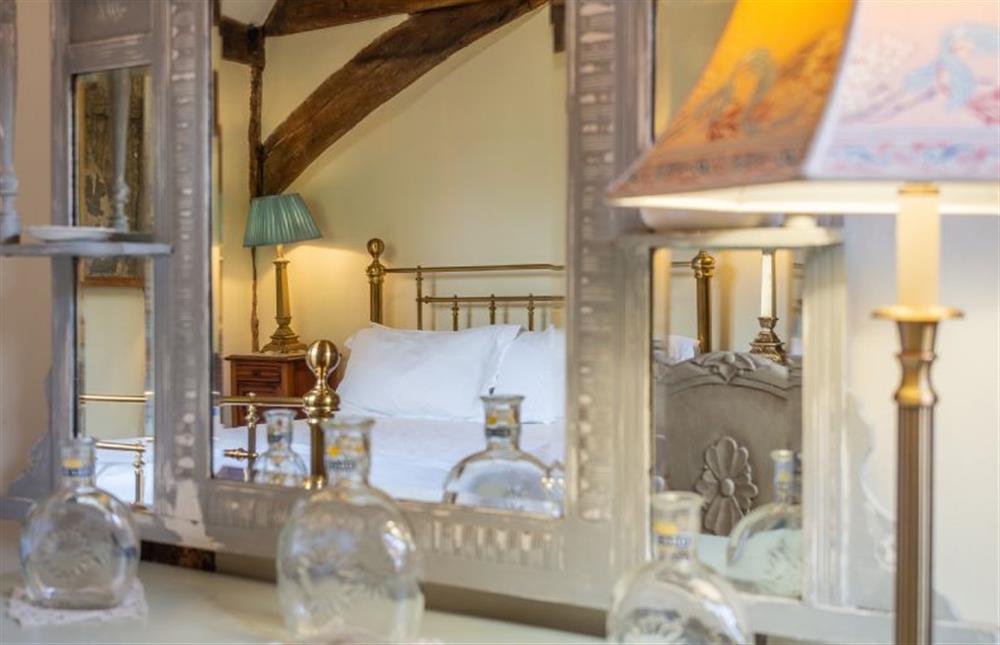 Bedroom two with ornate dressing table at The Tryst, Lavenham
