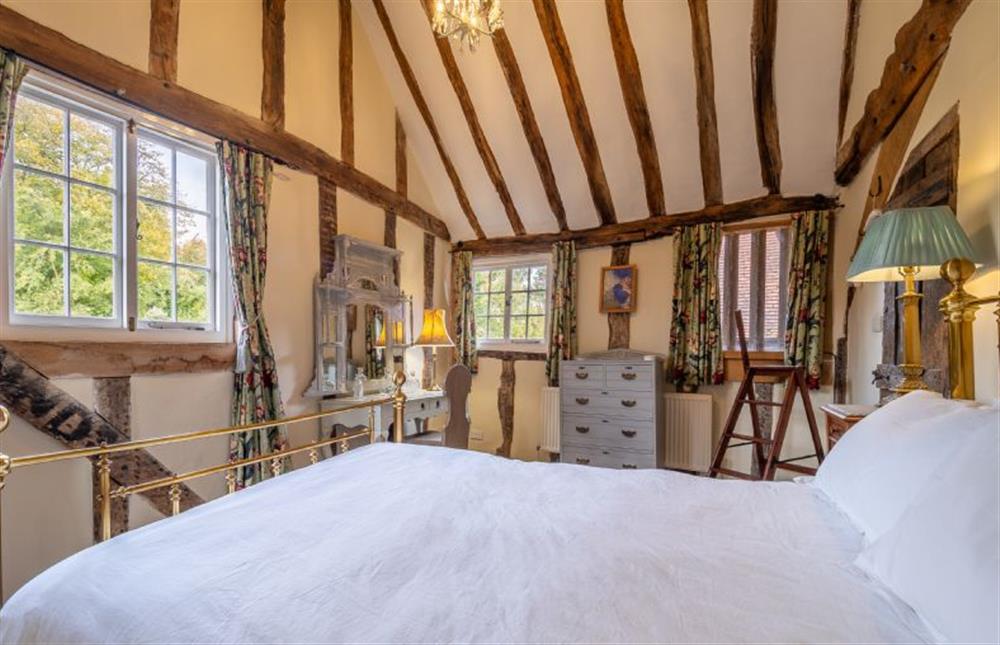 Bedroom two with views of the garden at The Tryst, Lavenham