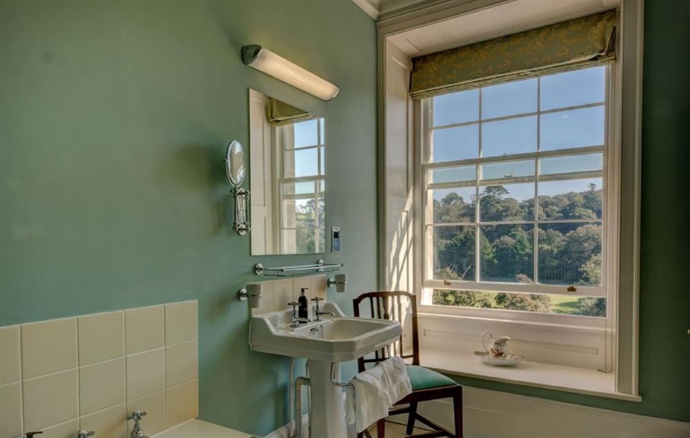En-suite bathroom with combined bath & shower at The Vean, Gorran