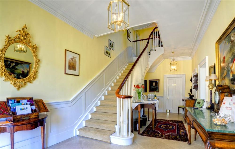 Grand entrance hall and staircase leading to the first floor