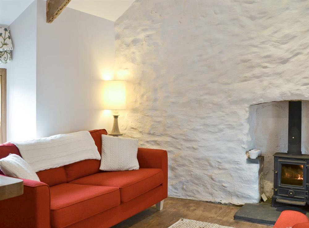 Cosy lounge area with wood burner at The Vestry in near Whitland, Dyfed