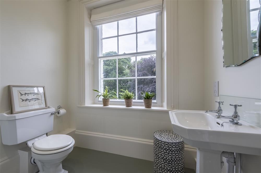 Beautiful garden views from bedroom one’s en-suite shower room at The Vicarage and Cottage, Great Limber