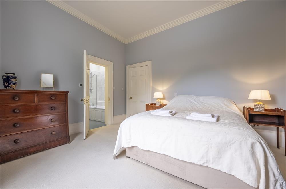 Bedroom three with a 5’ king-size bed at The Vicarage and Cottage, Great Limber