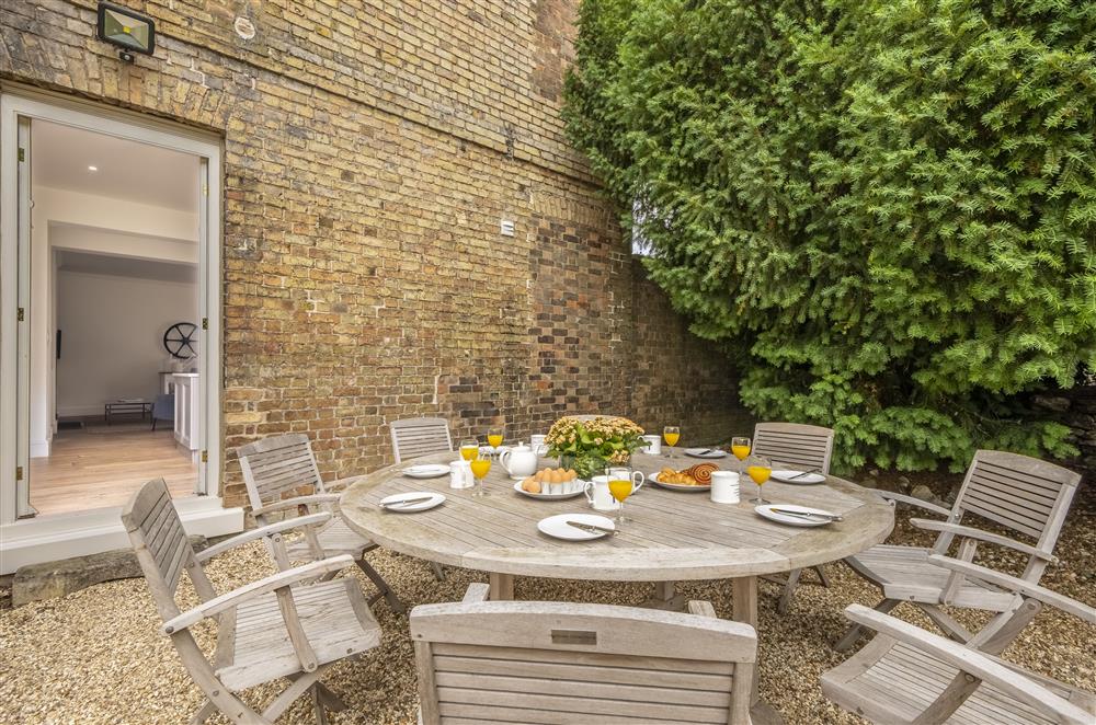 Enjoy alfresco dining on the terrace at The Vicarage and Cottage, Great Limber
