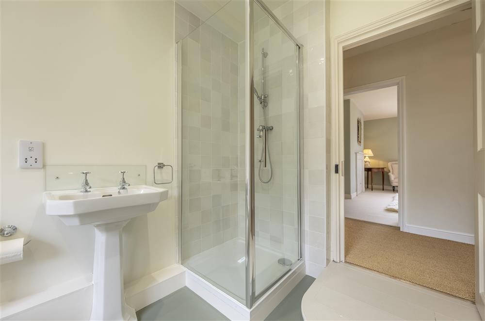 Family bathroom with a separate walk-in shower at The Vicarage and Cottage, Great Limber