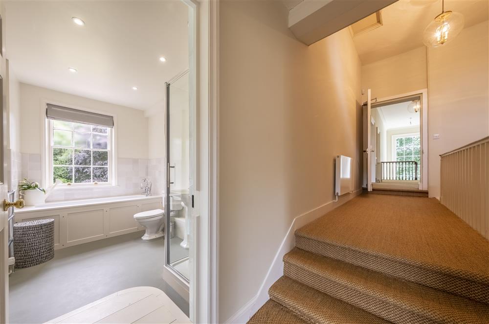 Landing leading to the spacious family bathroom at The Vicarage and Cottage, Great Limber