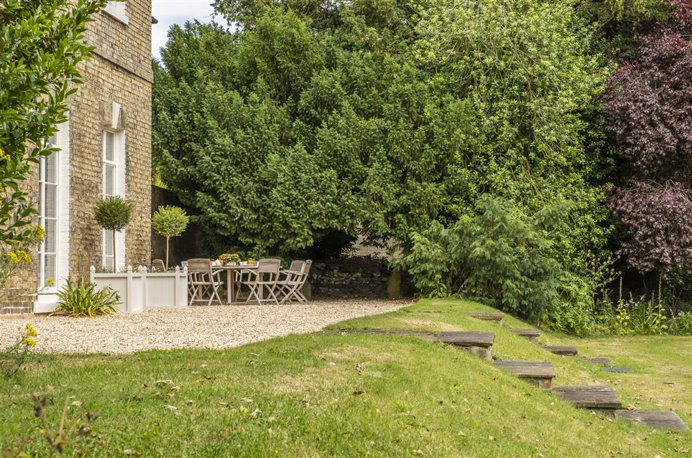 Low stepped terrace leads to the vast rear garden at The Vicarage and Cottage, Great Limber