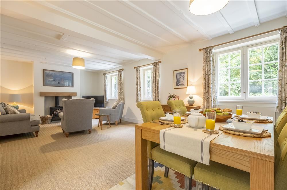 Open-plan dining and sitting area which is bathed in natural light at The Vicarage and Cottage, Great Limber