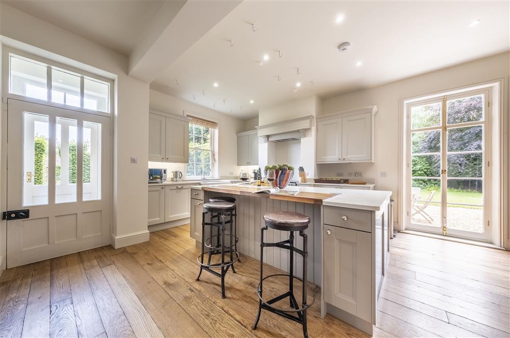 Stylish central island in the kitchen at The Vicarage and Cottage, Great Limber