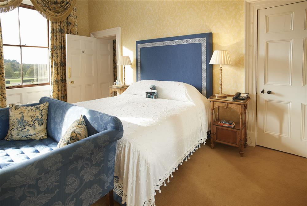 Disraeli bedroom with 6’ super-king size bed and en-suite bathroom at The Victorian Wing,  Weston-under-Lizard, Shifnal