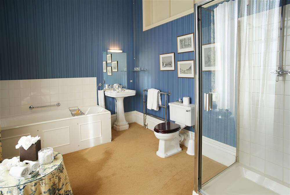 En-suite bathroom with bath and separate walk-in shower at The Victorian Wing,  Weston-under-Lizard, Shifnal
