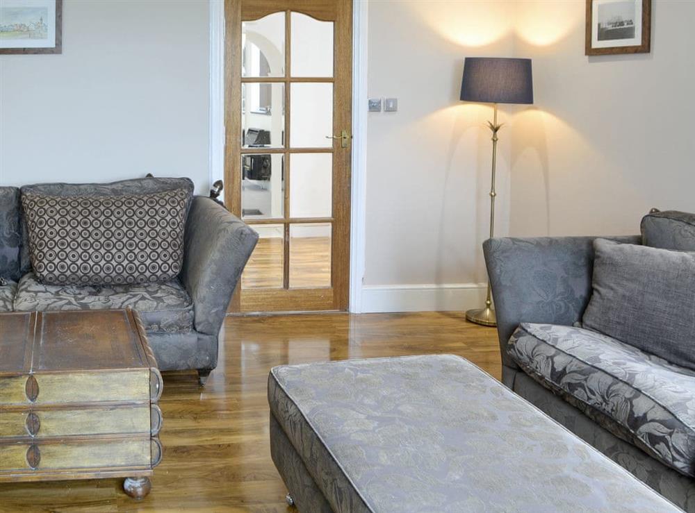 Comfortable seating within living room at The View Old Coastguard Cottage in Tynemouth, Tyne and Wear