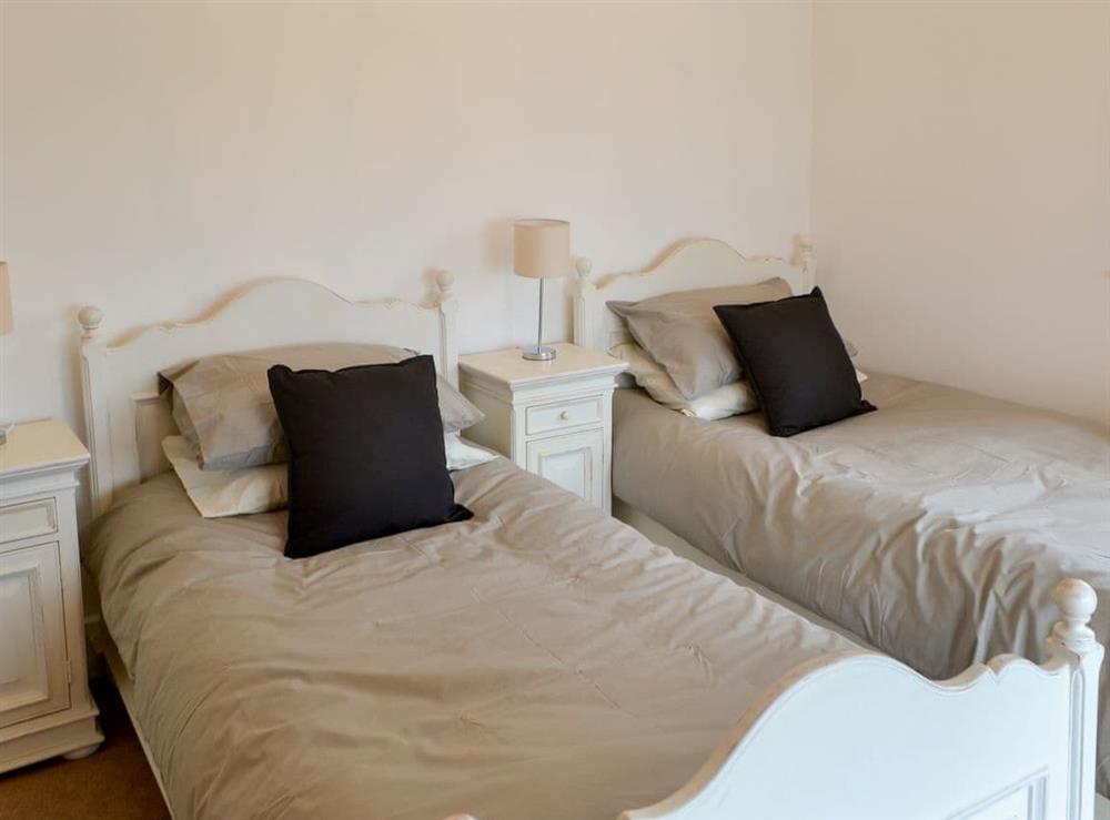 Light and airy twin bedroom at The View Old Coastguard Cottage in Tynemouth, Tyne and Wear