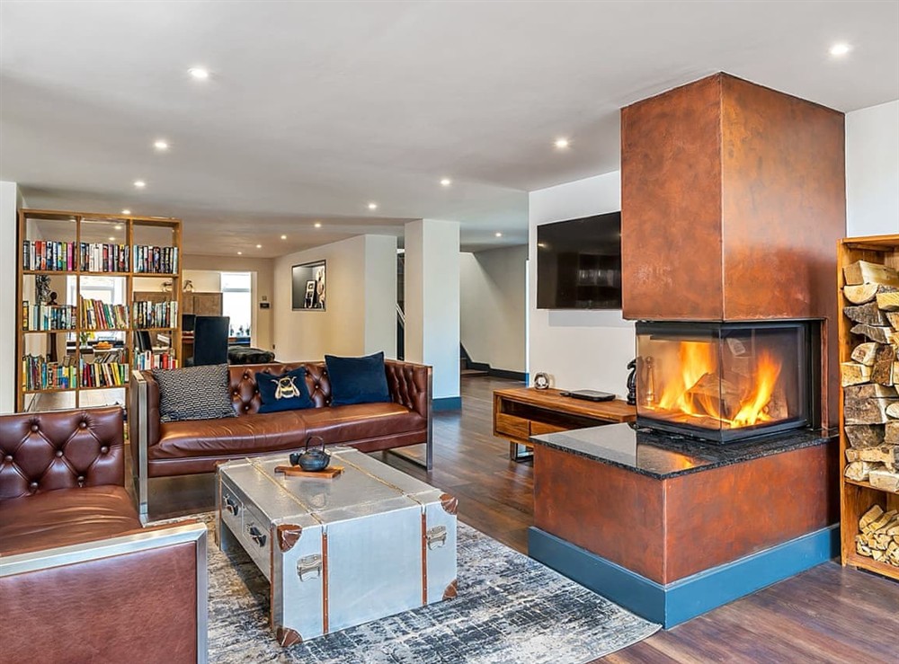Living room and log burner at The Village Hall in Consett, Durham