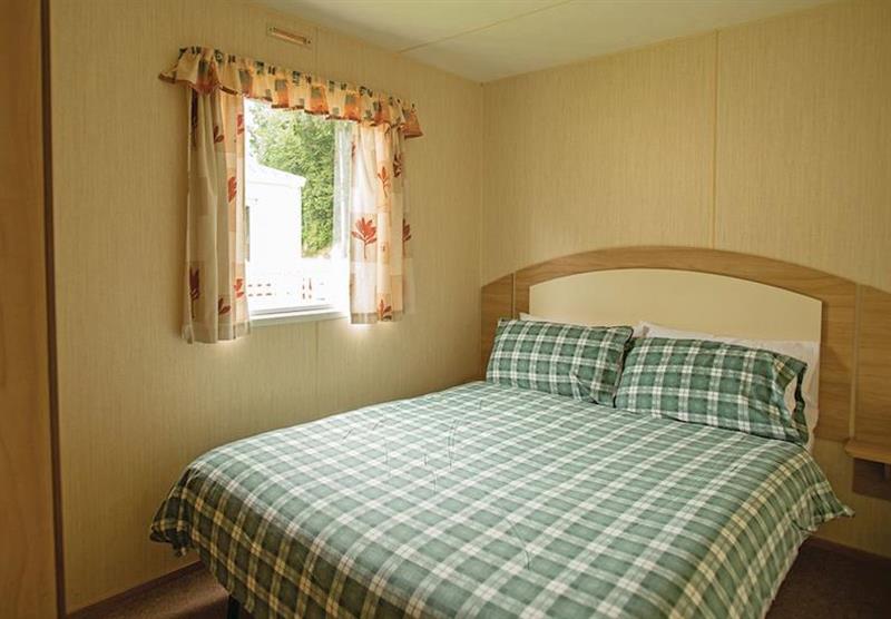 Bedroom in a Bronze 3 at The Village Holiday Park in Cross Inn, Nr New Quay