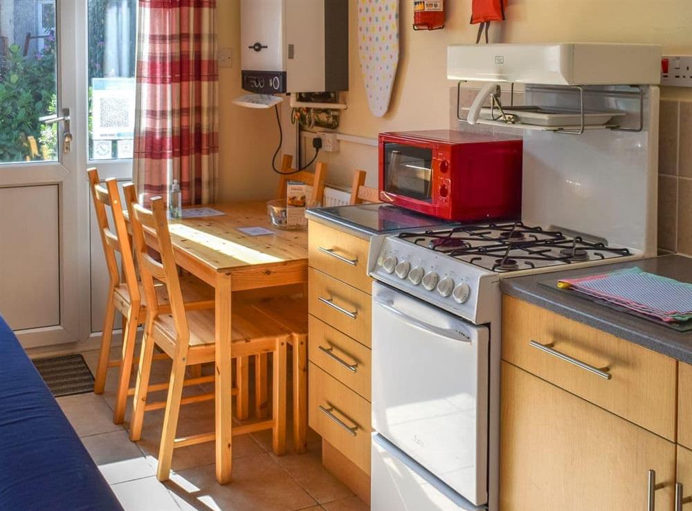 Typical kitchen/diner at The Vineries- Beech Cottage in Lands End, near Porthcurno, Penzance, Cornwall