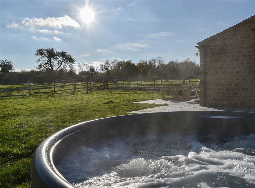 Delightful hot tub with stunning view at The Wagon House in Ilford, near Ilminster, Somerset