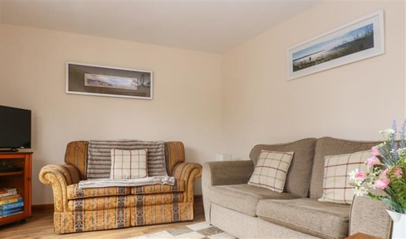 Relax in the living area at The Wagon House, Launceston