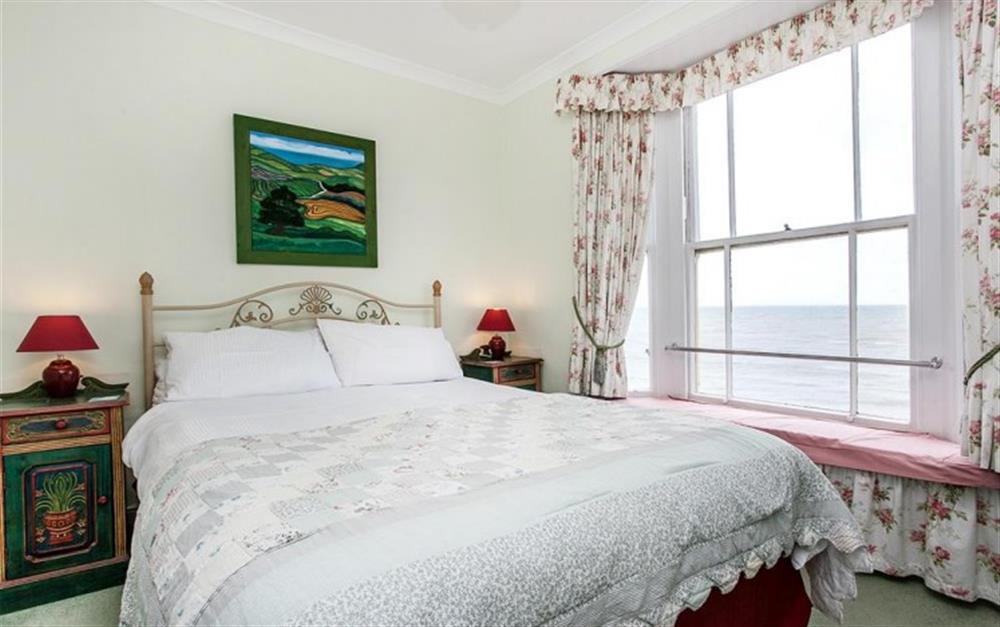 Bedroom 2 with a kingsize bed and a window seat to enjoy the sea views at The Walk in Lyme Regis