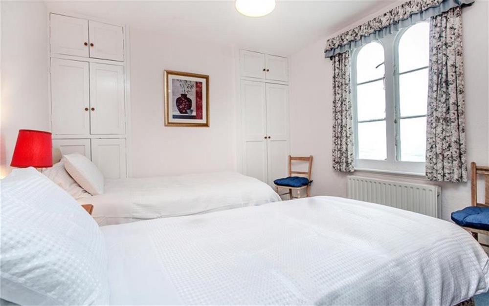 Bedroom 3 with twin beds and sea views at The Walk in Lyme Regis