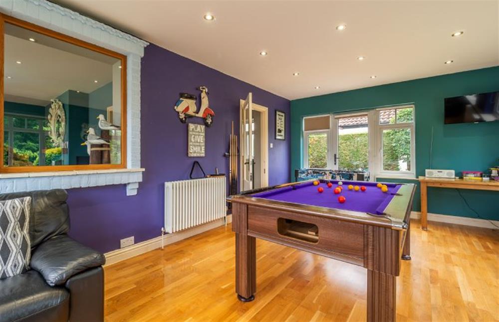 Ground floor: The games room has pool table and wall-mounted television at The Warren, Old Hunstanton
