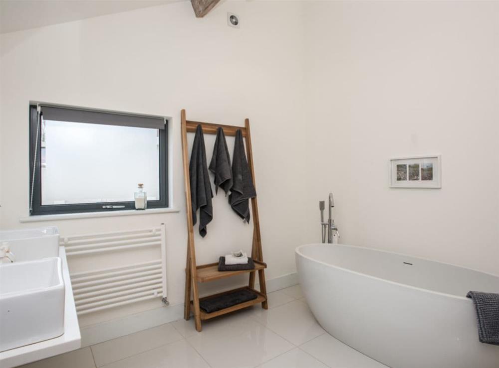 Bathroom with stand alone bath at The Wash House in Roughton, near Cromer, Norfolk