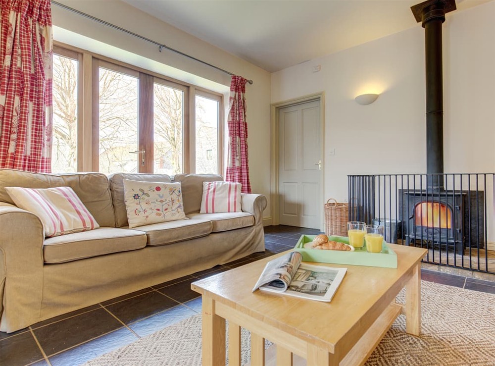 Living room at The Wash House in West Beckham, Near Holt, Norfolk