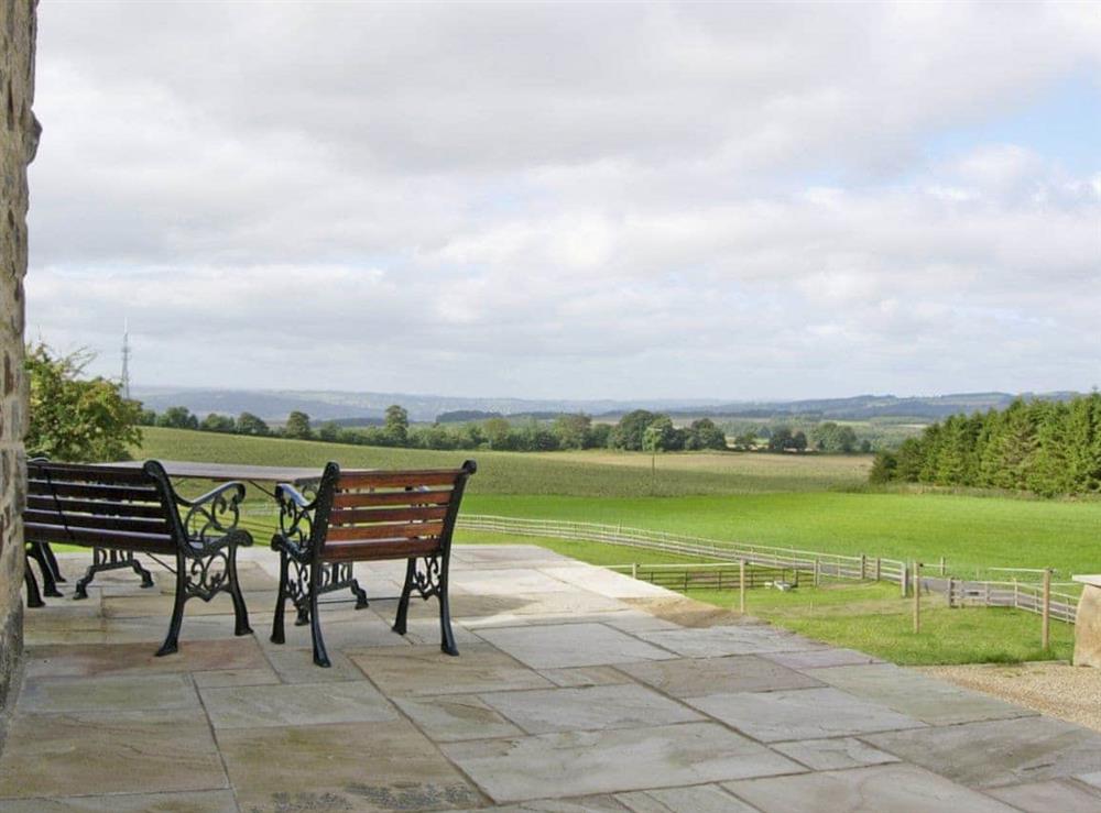 Enjoy the peace and quiet in the large lawned garden with patio, terrace and furniture at The Water Castle in Newton, Nr Corbridge, Northumberland., Great Britain