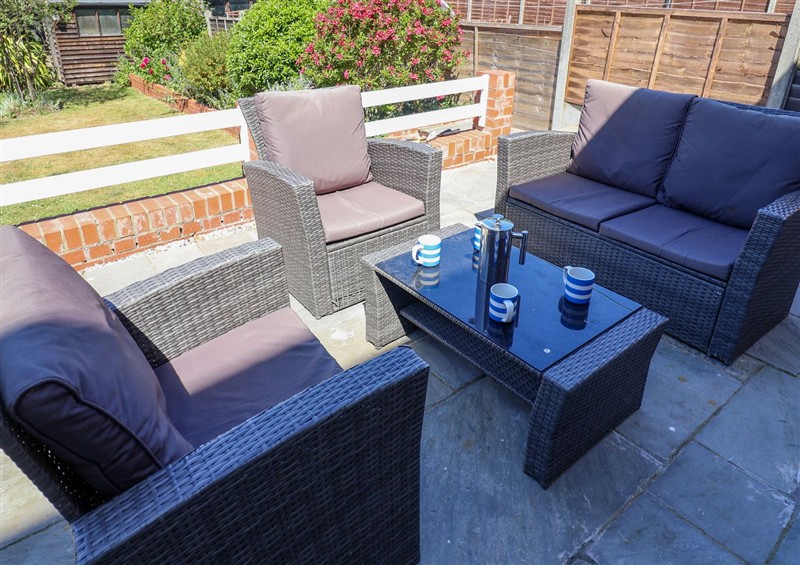 Enjoy a glass of wine on the patio at The Waverley, Southwold