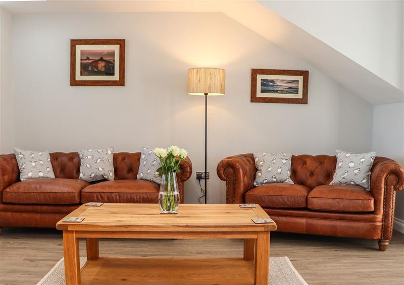 Relax in the living area at The Waves, Amble