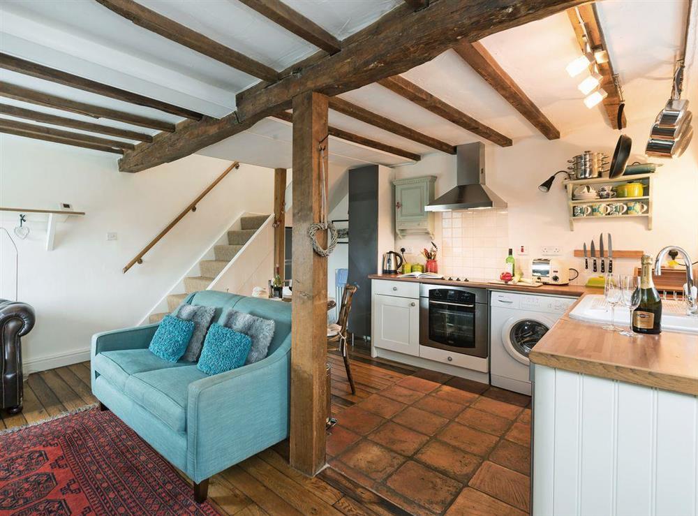 Lovingly restored open plan living room and kitchen at The Wee House on the Hill in Wirksworth, near Matlock, Derbyshire