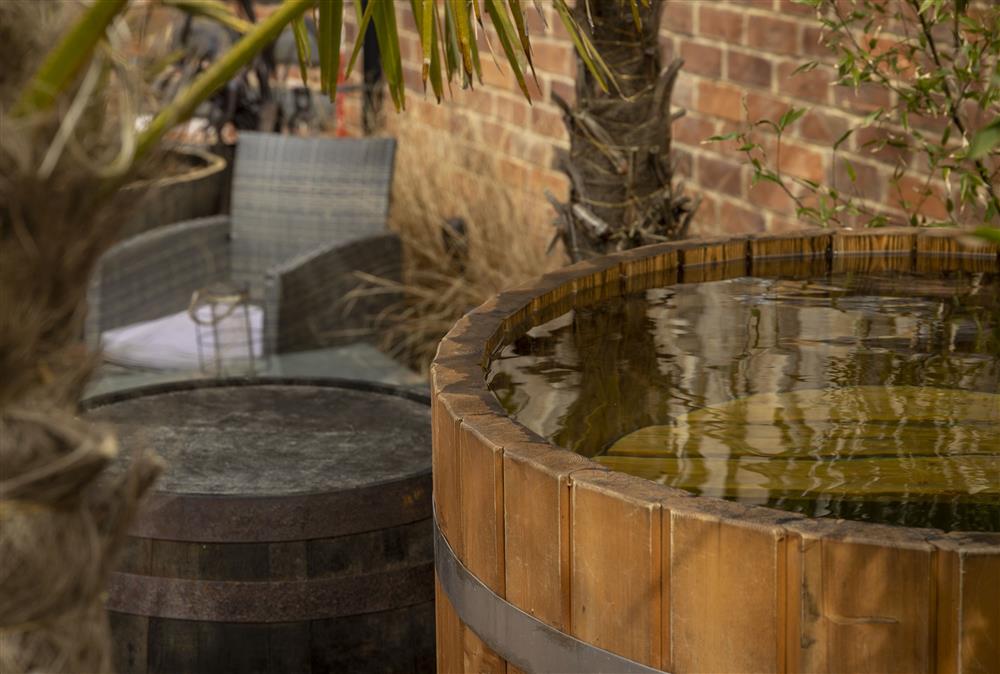 The outside hot tub area at The Well House at The Well House, Finstall nr Bromsgrove